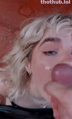 Smearing her beautiful face with all the semen that came out of my dick when I came after a tremendous blowjob